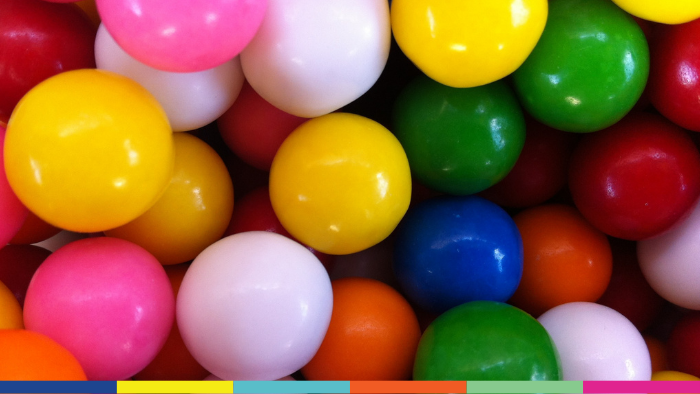 assortment of different color gumballs